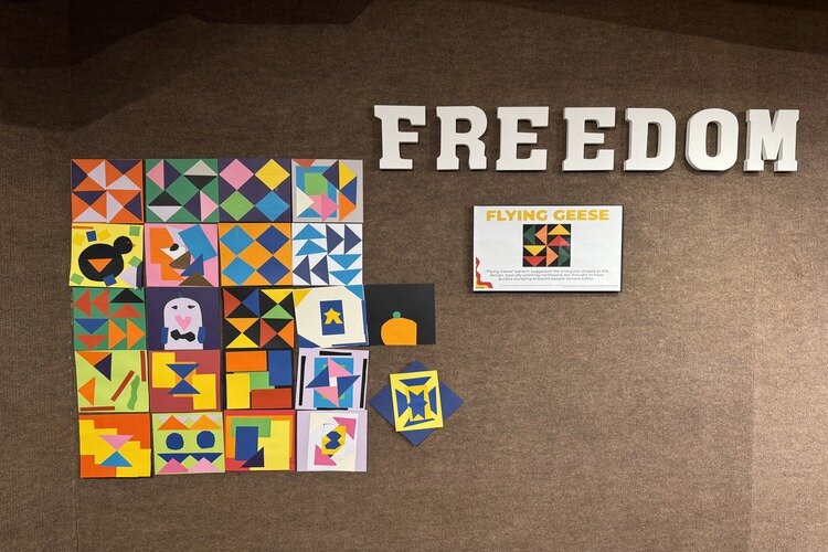 A replica of a freedom quilt where triangles, signifying flying geese heading north, pointed slaves toward freedom.