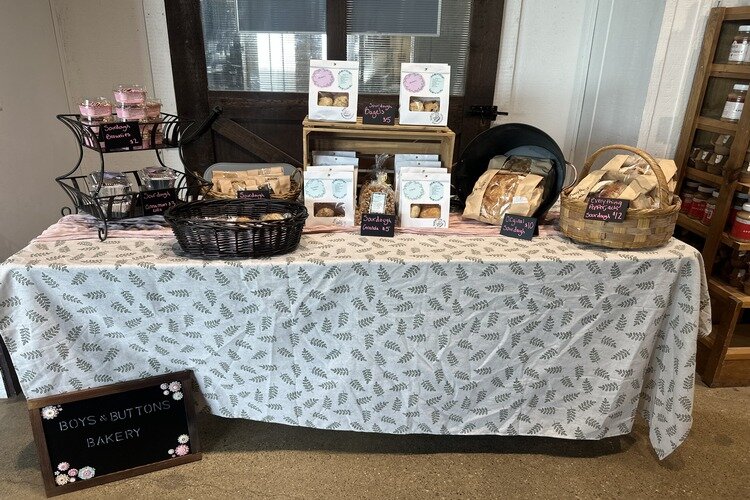 Boys & Buttons market stand at Blakes Backyard in Almont.