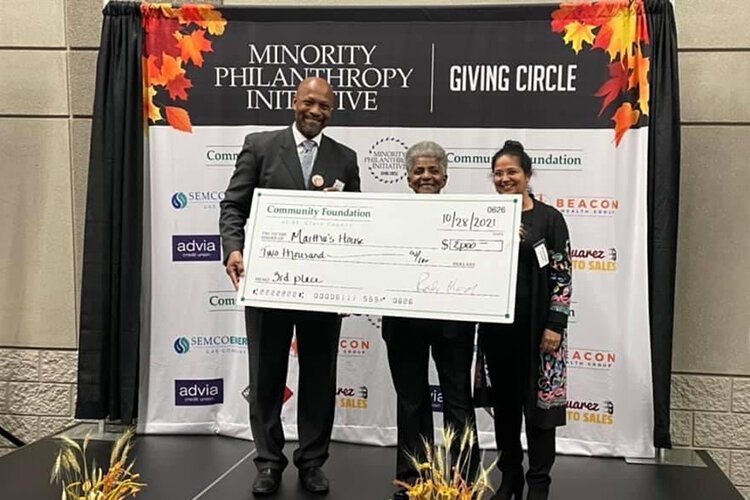 Martha Moore, owner of Martha’s House, is awarded a grant during last year's Minority Philanthropy Initiative.