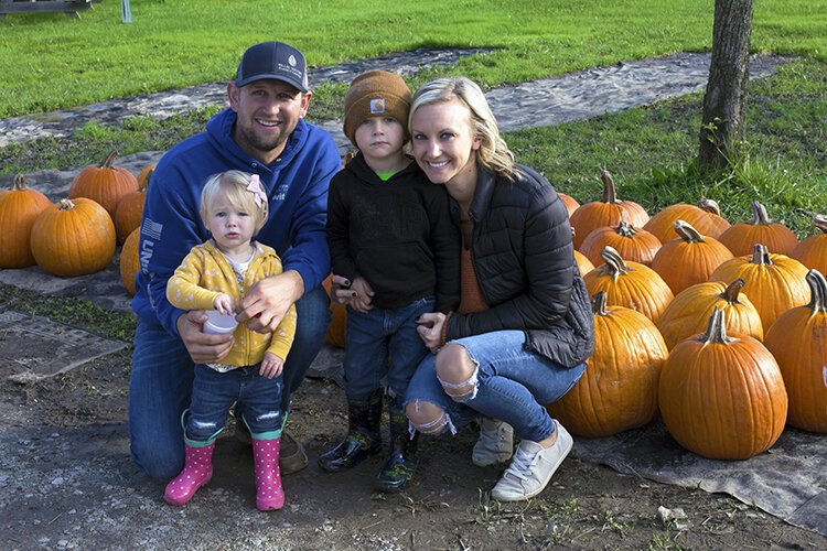 Jeff and Dawn Schweiger pose for a photo with their children Madison (left) and Luke at Pankiewicz Cider Mill & Farm Market. 

"It's nice because it's small, quiet, and the donuts are good. We really like it here," says Dawn Schweiger. "Everyone's really friendly and it's right in our backyard basically. We've been here a couple of times and every time we come it's been great."
