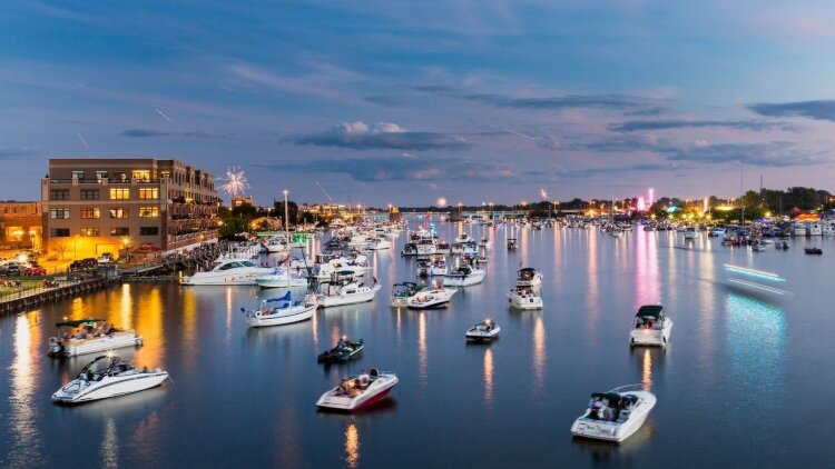 Bay City’s well-known fireworks festival returns in 2021. One of the best viewing spots for the show is from a boat in the Saginaw River. (Photo courtesy of Great Lakes Bay CVB)