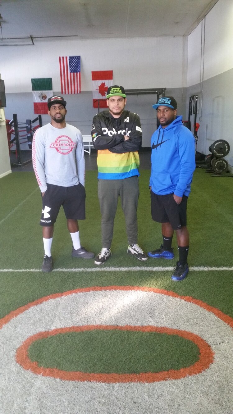 Tim and Matt Browning with assistant boxing coach Carlos Salazar, center