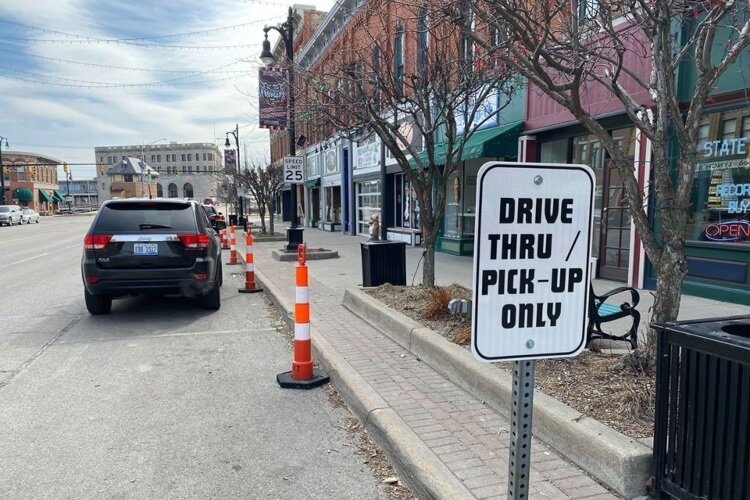 Drive -thru and pick-up lanes have been established in downtown Port Huron to help patrons do their business quickly.