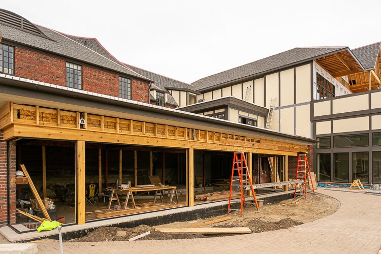 Crews work to complete exterior work at the St. Clair Inn