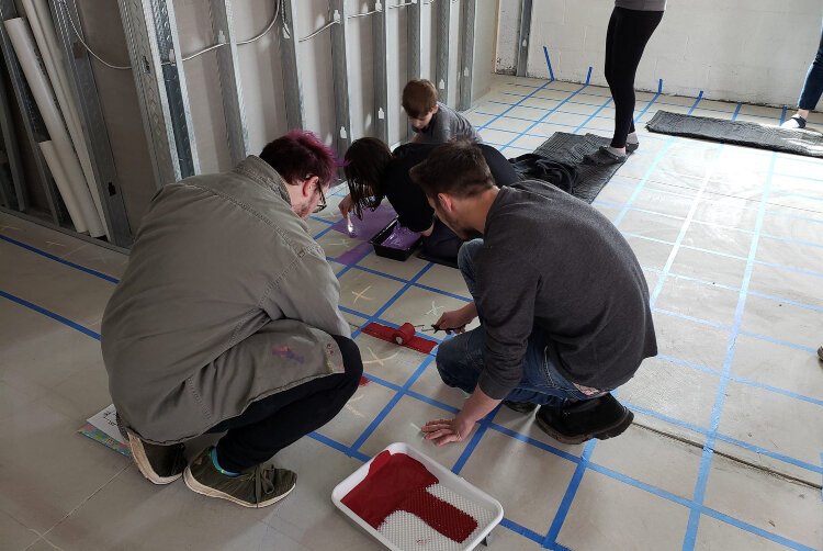 All hands are on deck to create the perfect space for teens.
