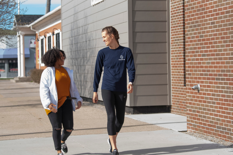 SC4 students Emily Fleischmann and Giovanni Carden enjoy a walking in downtown Port Huron.