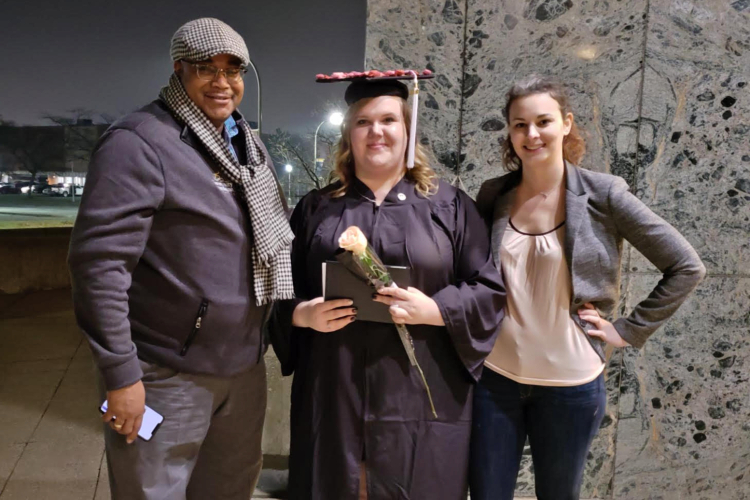 Nikki Leonard (center) with Kevin Totty (left) and Audrey Sochor (right) following graduation.