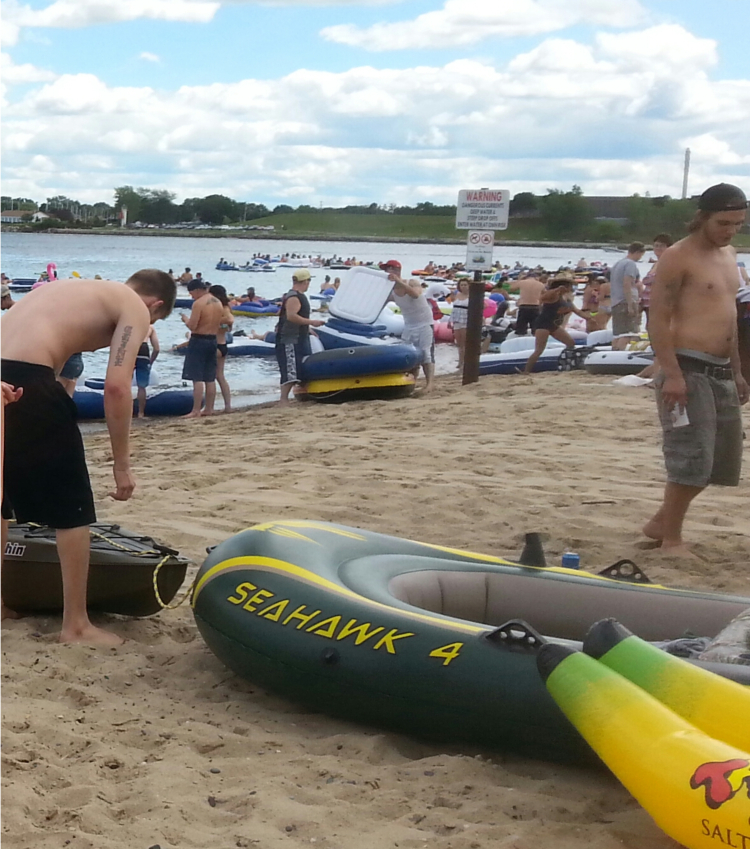 Floaters prepare their boats for a day in the St. Clair River