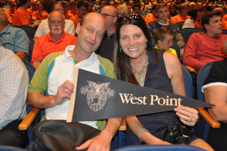R.J.'s proud parents, Richard and Tara Russel, display the West Point banner./Karen Hain