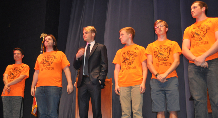 R.J. Russel with his robotics teammates.