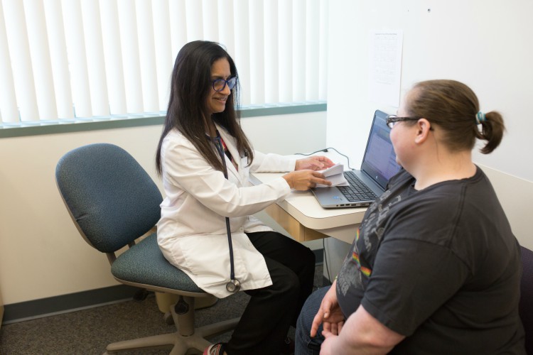 Dr. Sushma Reddy talks to patient Magen Chavarria.