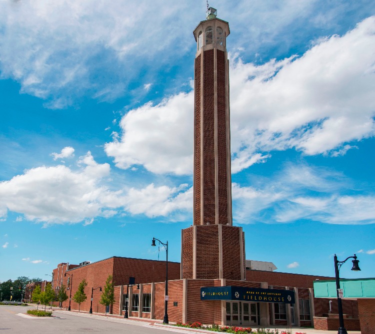 The state of the art fieldhouse has a regulation basketball court and second level running track.