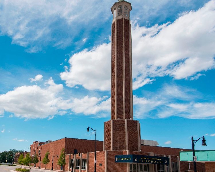 The state of the art fieldhouse has a regulation basketball court and second level running track.