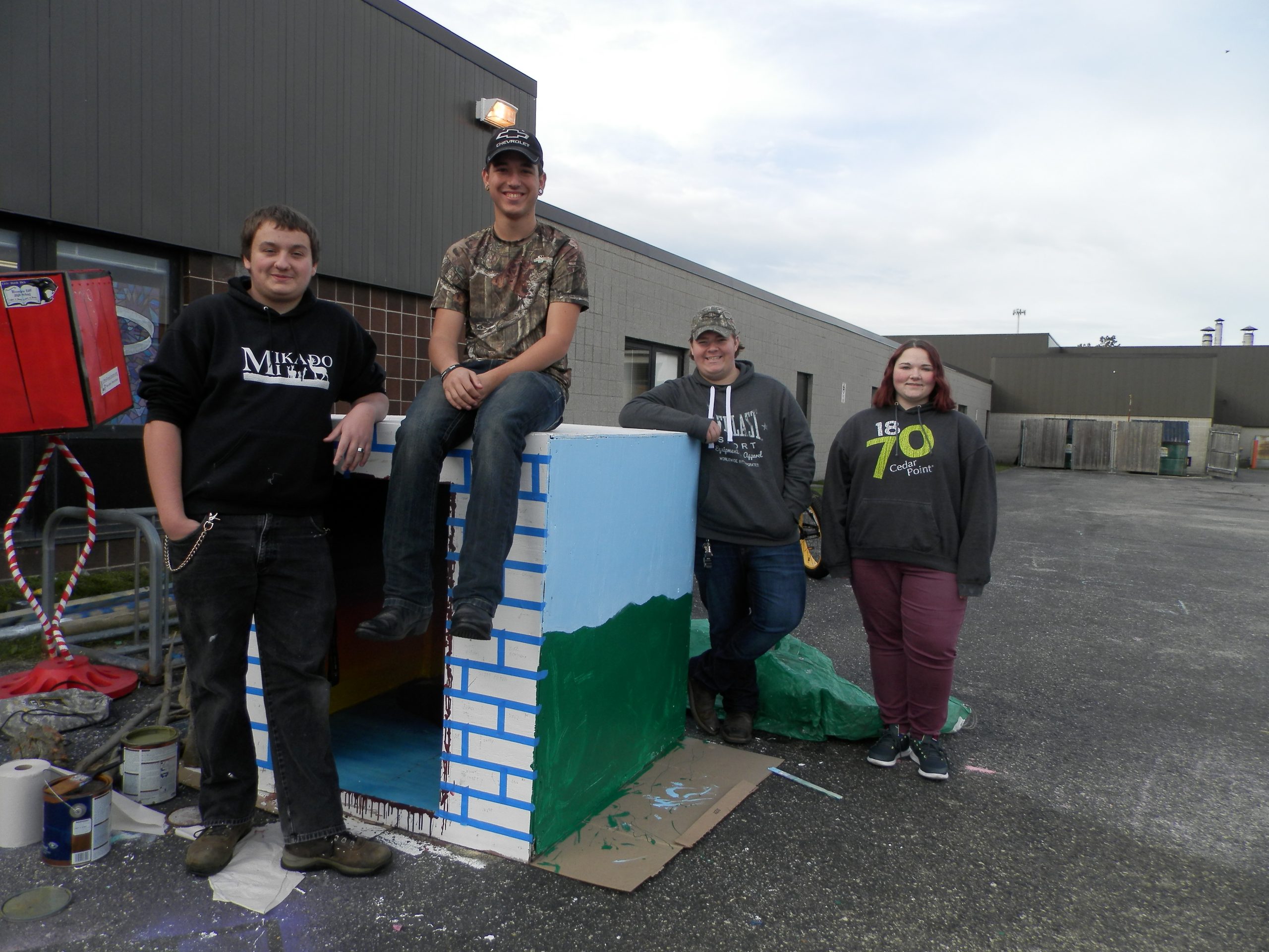Dalton Formaz, Darrin Richards, Taylor Finley,and Alissa Warrack have one side of the box to express themselves.They have chosen the theme of Alice and Wonderland.