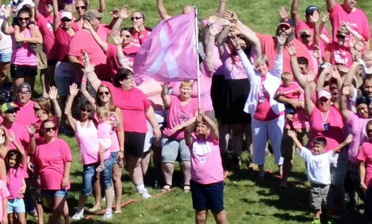 Cancer Survivors form a Human Cancer Ribbon