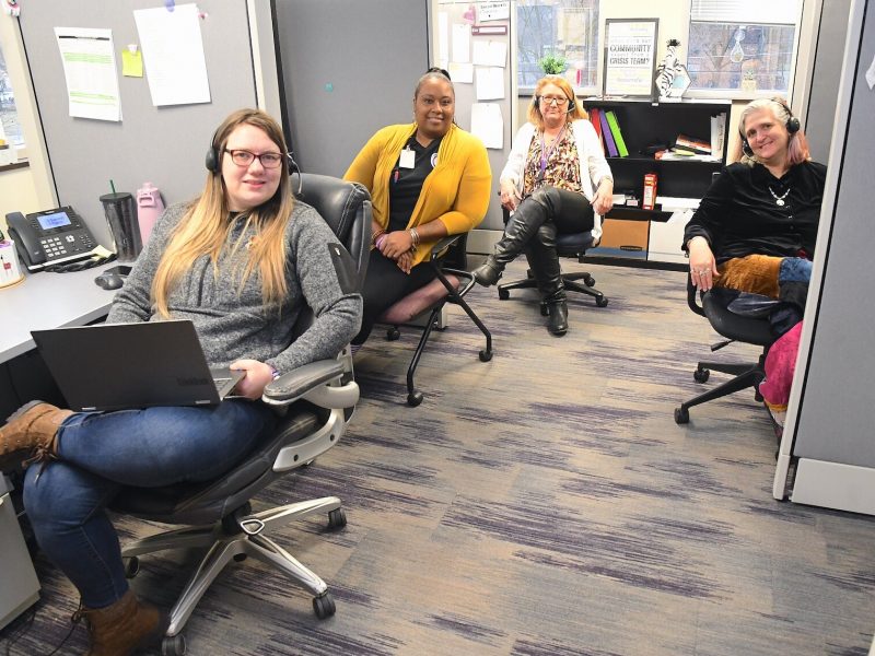 Call line staff working in the team room at Summit Pointe’s First Step Urgent Care.