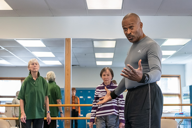 Paul Clark leads an enhanced fitness class at Turner Senior Resource Center.
