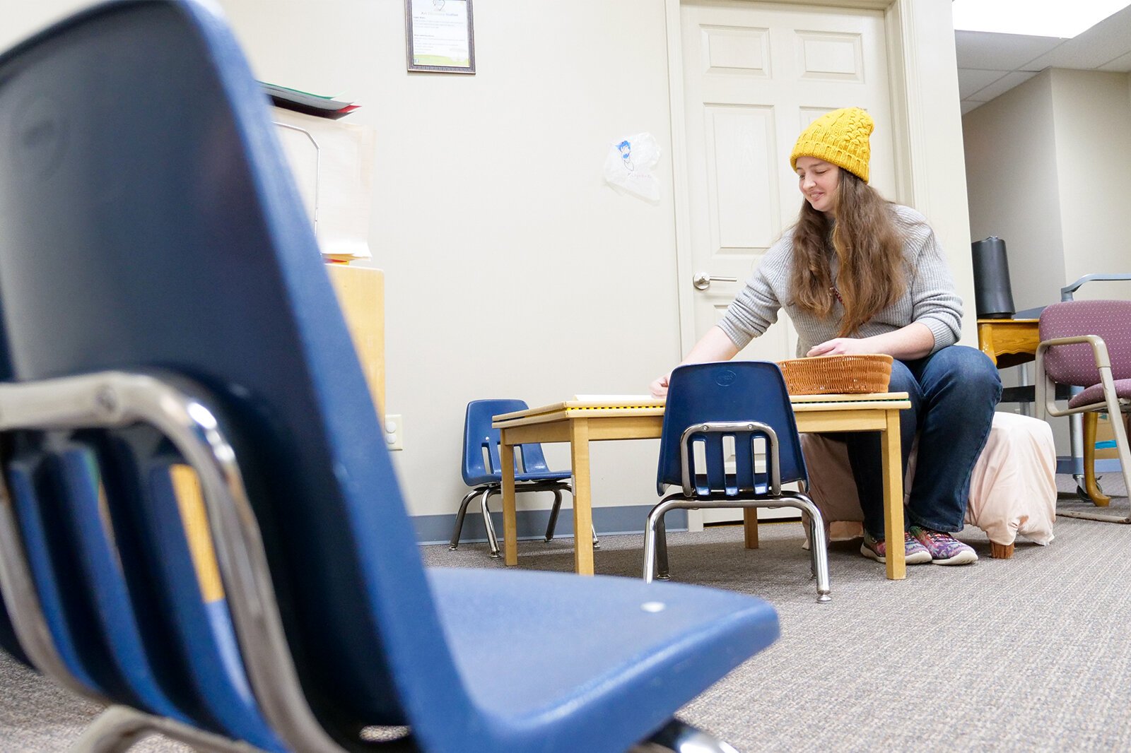Director Samatha Mitchell prepares for Children’s Discovery Academy grand re-opening. The center offers weekly indoor activities for families. A $5/group suggested donation raises funds for the center’s construction.
