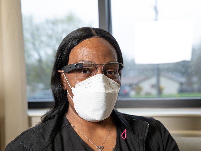 Dee Meux, a certified nursing assistant at Samaritas, wears Glass smart glasses.