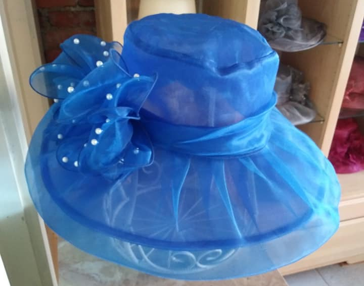 Georgina Witt makes hats to sell in her Port Huron artisan's market