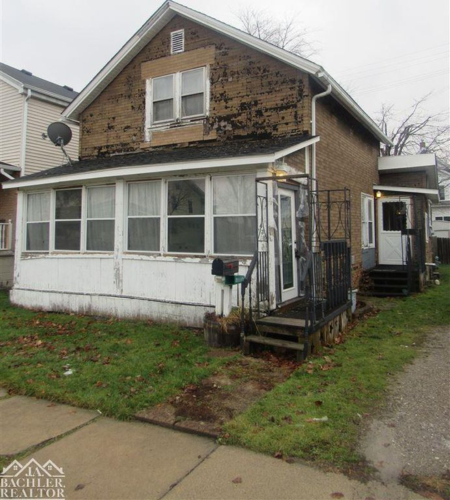 This Marine City home is looking for the right investor.