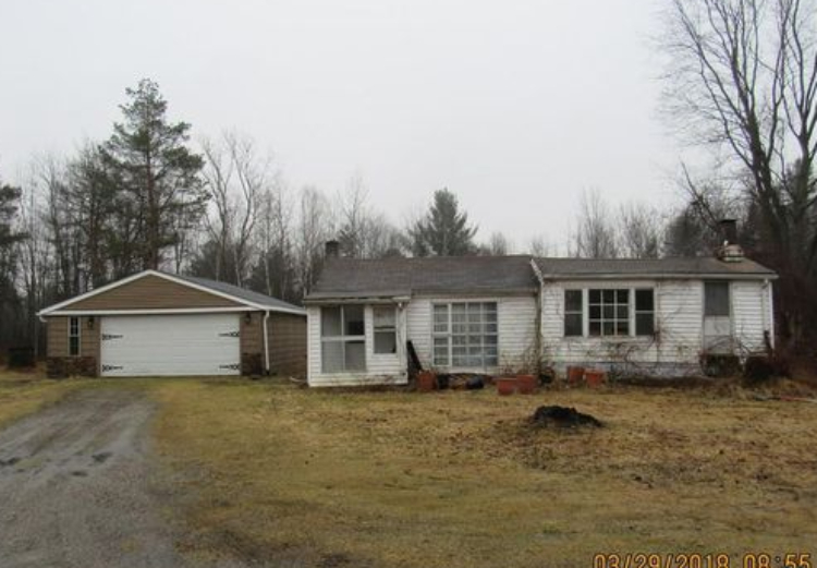A little TLC can make this house a home again.