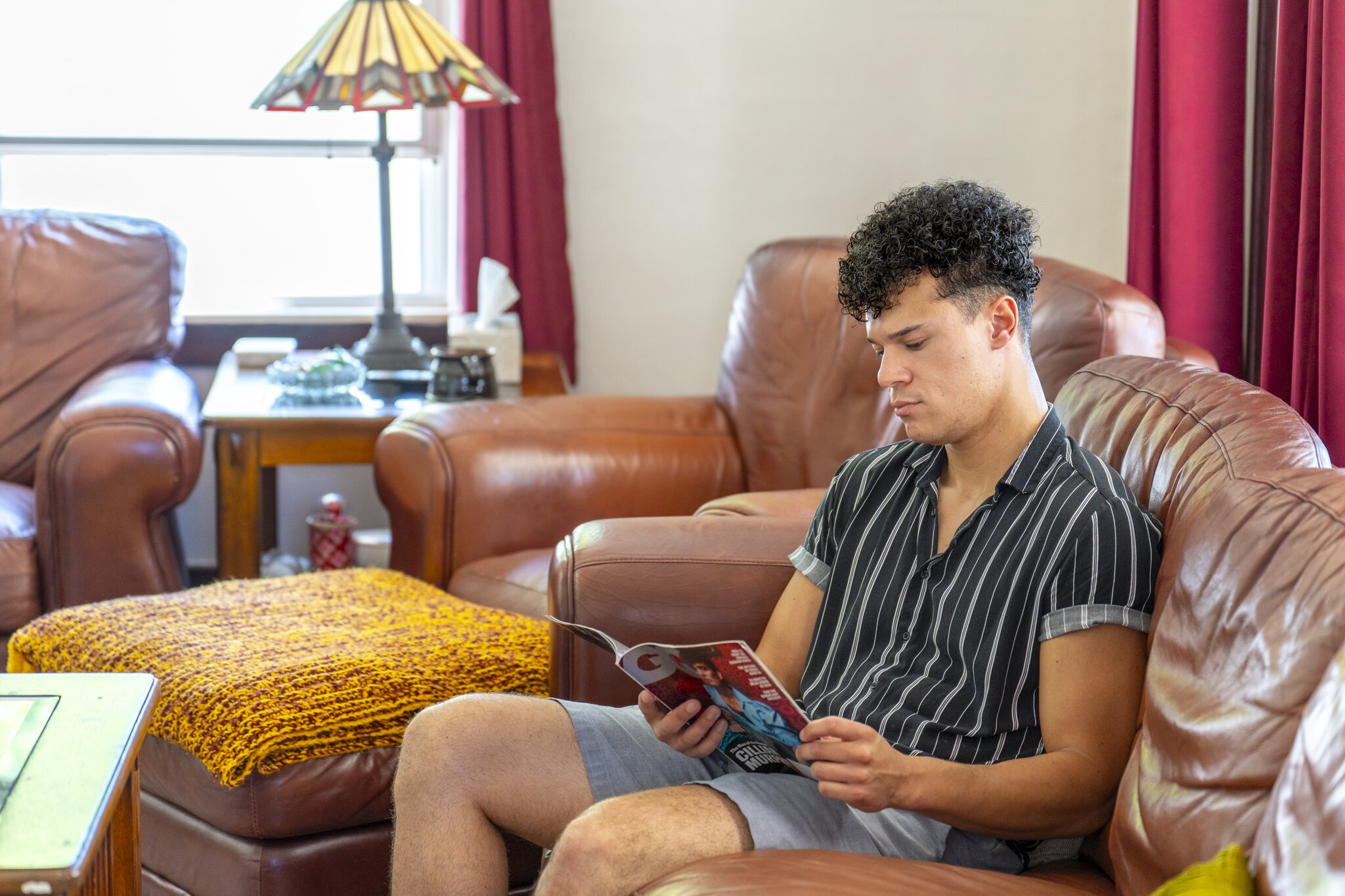 Mateo Savedra inside his home in Port Huron.